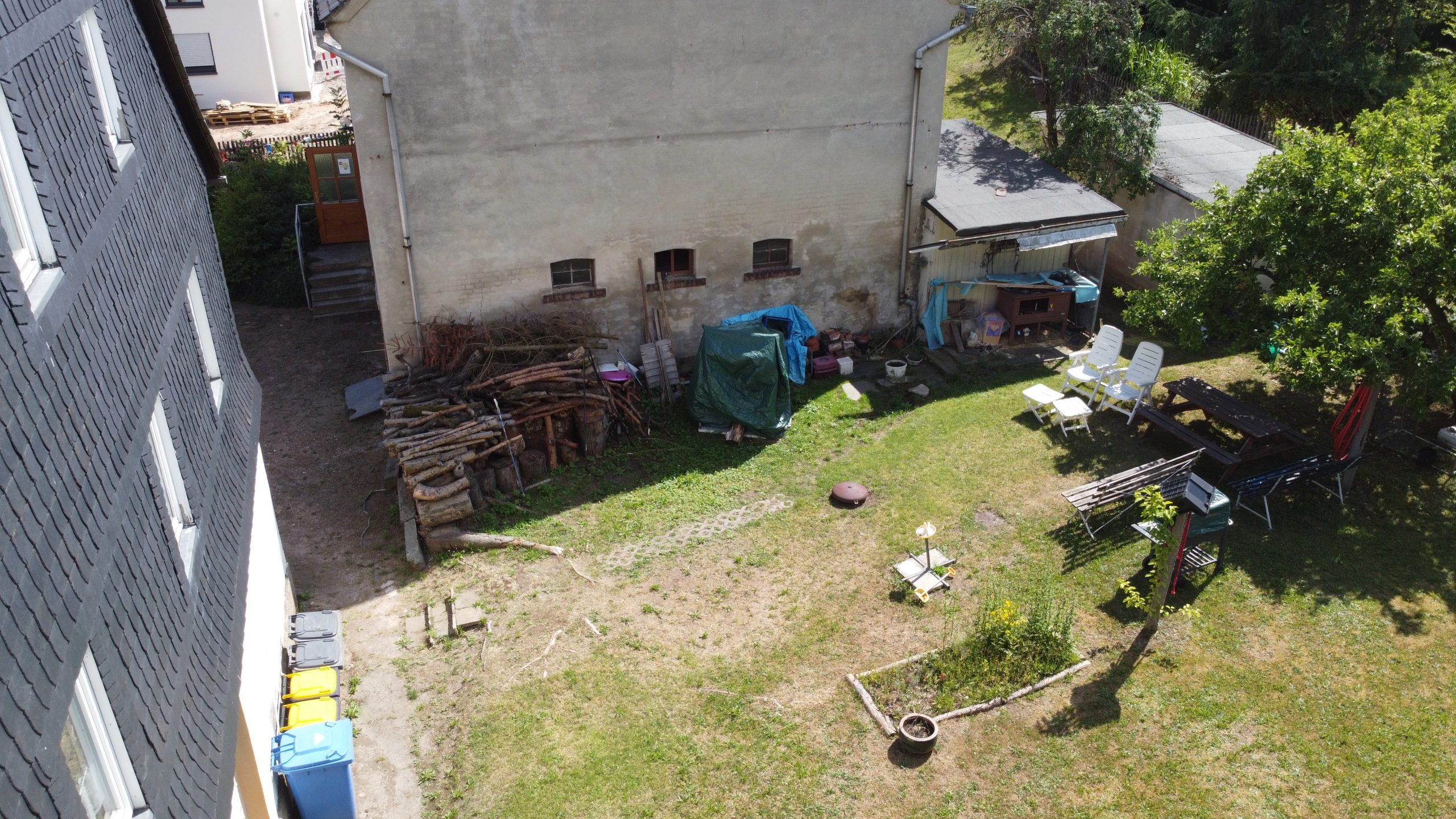 Außenwand an der ein überdachter Werkbereich erstehen soll